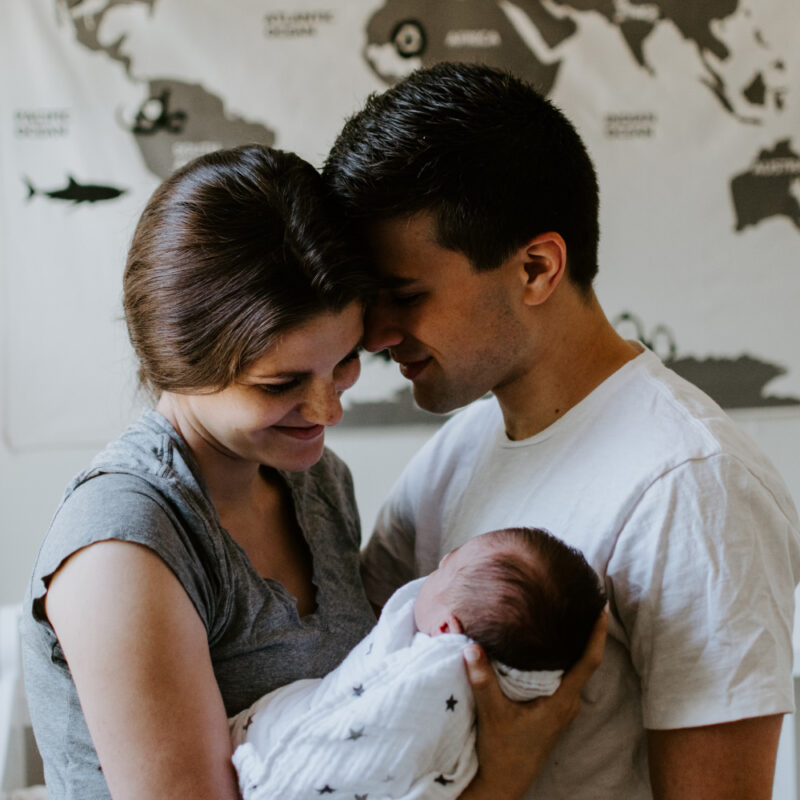 Parents Holding Newborn Baby